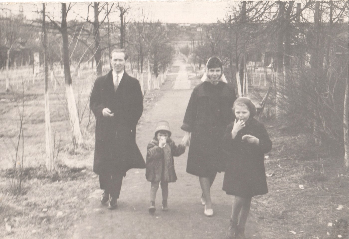 My grandparents and their daughters in a family archive photograph