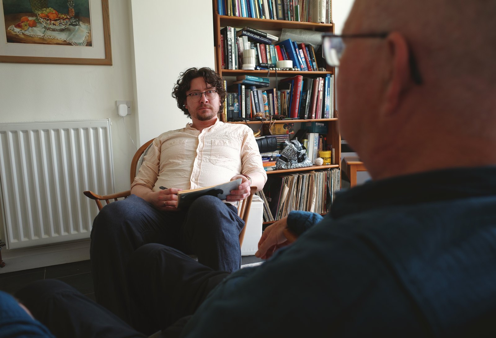 Dr Grigory Grigoryev conducting a life-story interview in a home setting